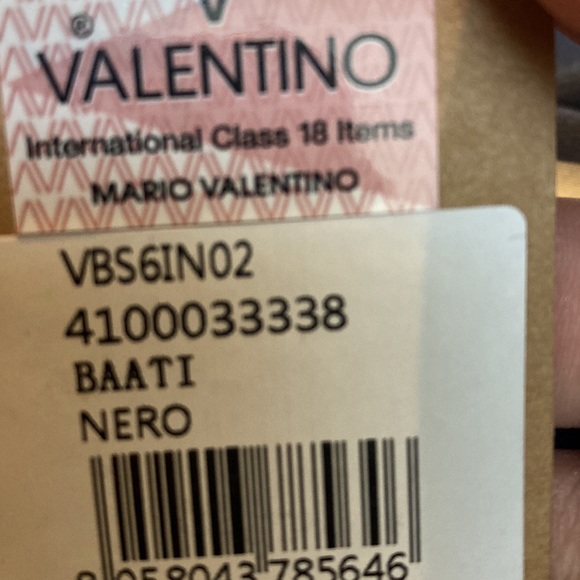 Mario Valentino used one time